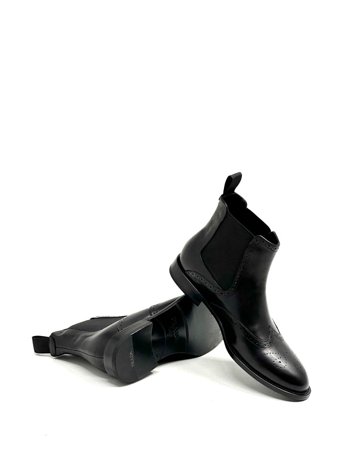 Prada Челси из кожи Черный